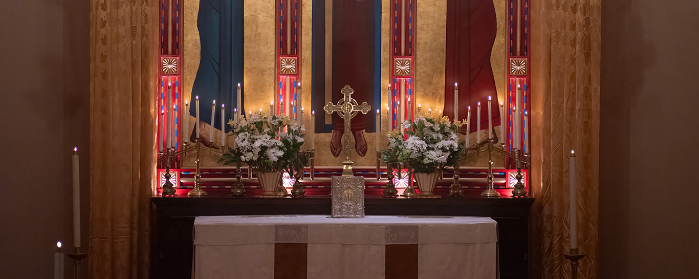 Altar with candles and flowers on Christmas Eve