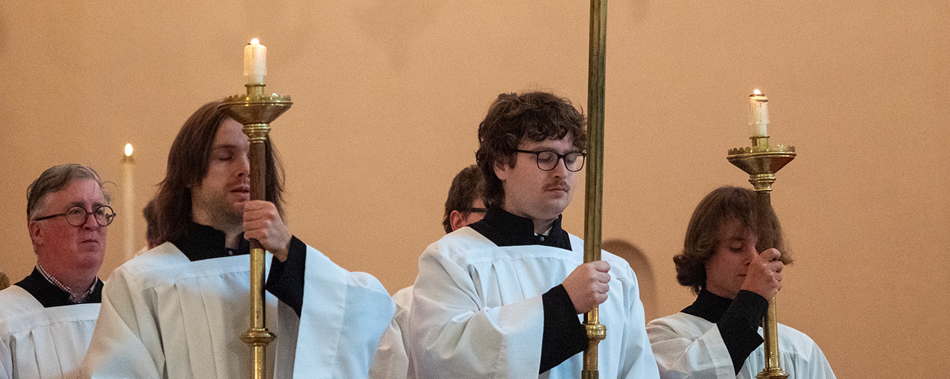 Servers recessing during the closing hymn at Trinity III