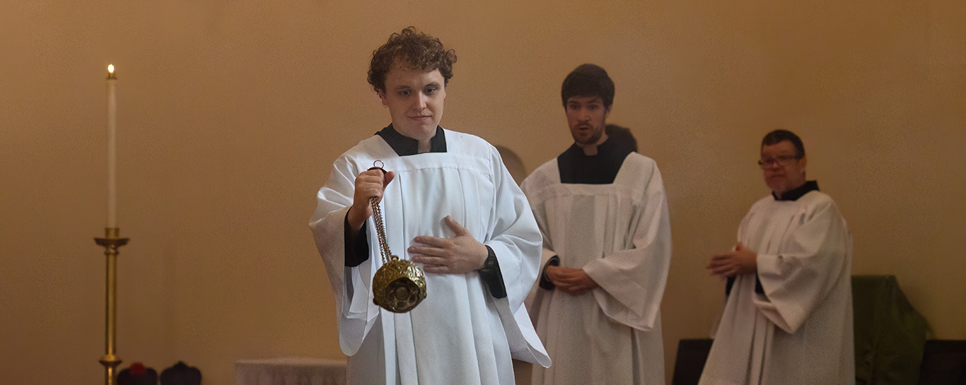 A thurifer censes the congregation during Trinity IX, August 2, 2026