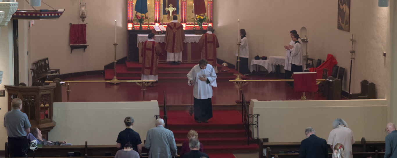 A server censes the congregation during the feast of the Holy Cross