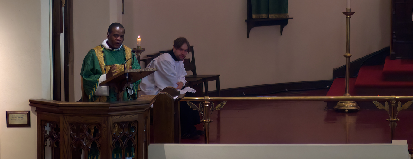 Fr Kwari giving a sermon from the pulpit on September 20, 2026.