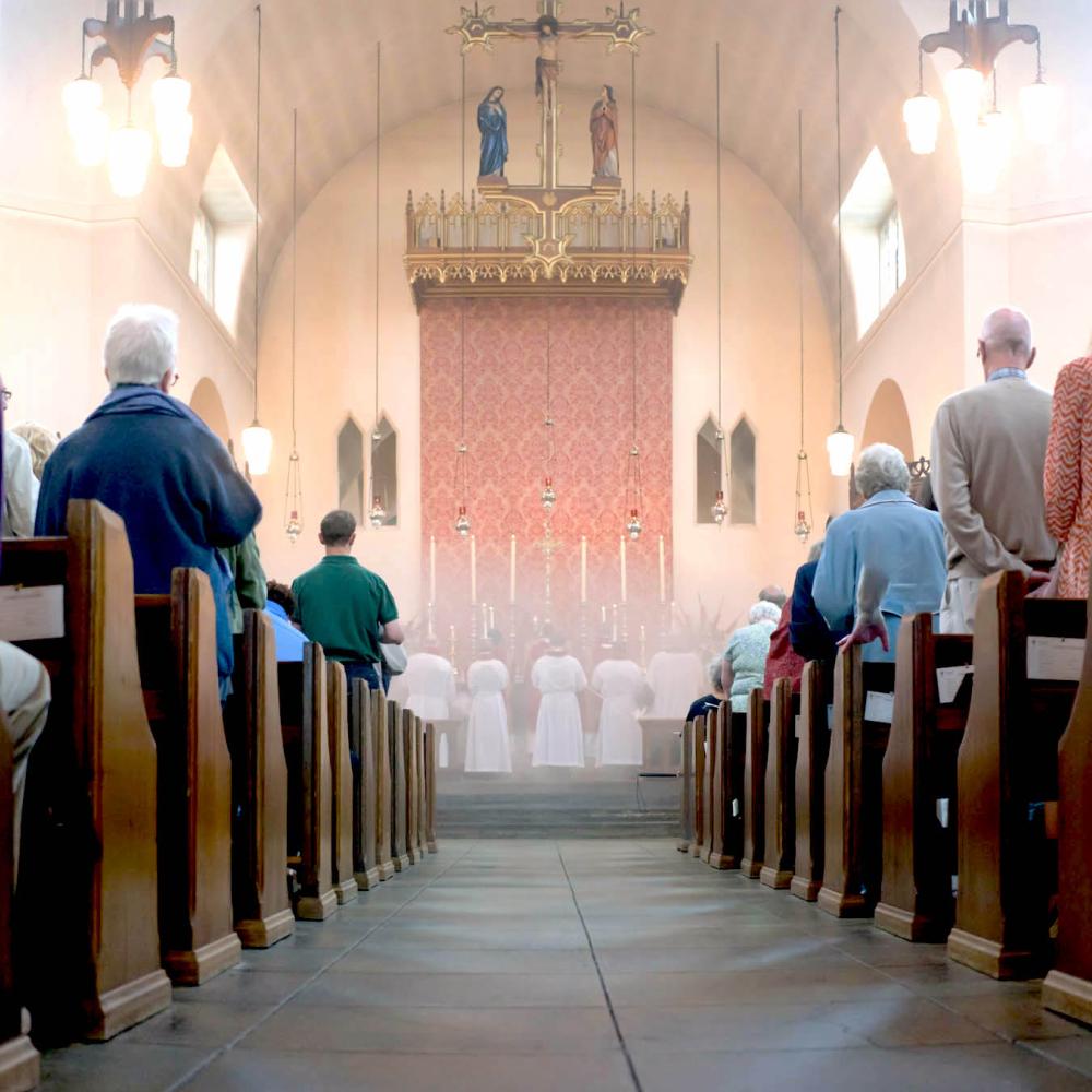 Interior of St James showing the censing of the altar